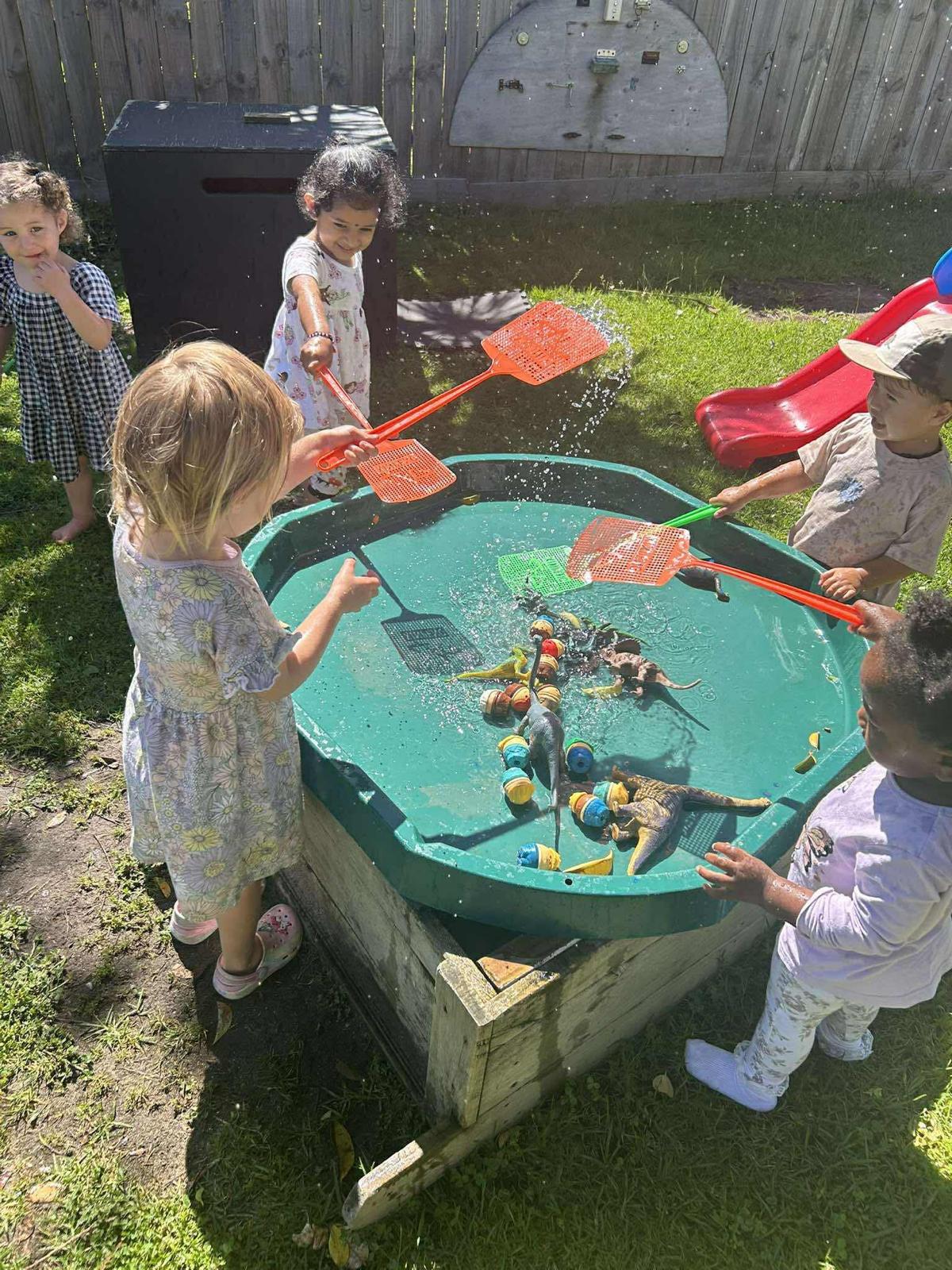 Children learning and playing at Little Village Preschool